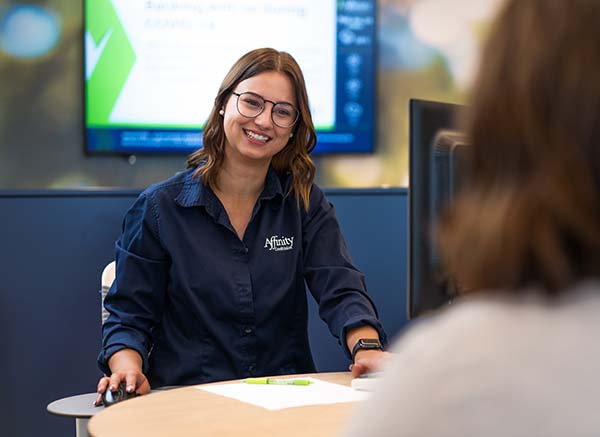 Young female employees helps member